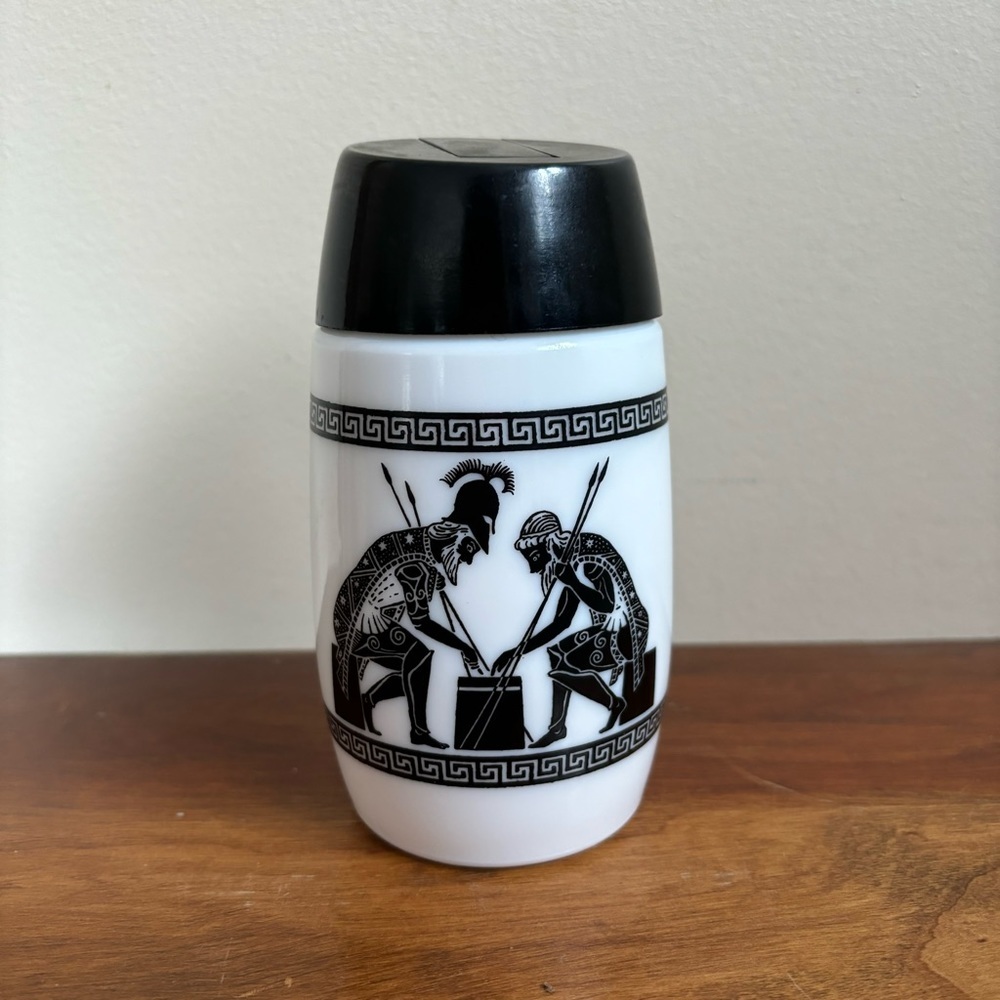 Grecian themed milk glass sugar dispenser